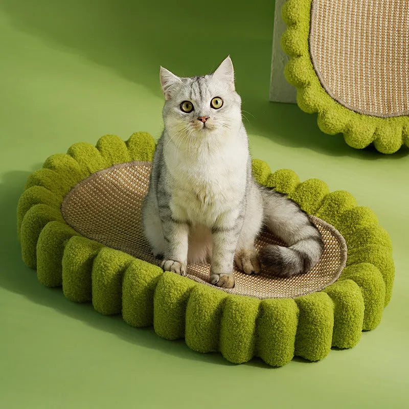 Green oval cat scratch pad bowl with sisal scratching surface and built-in cat bed
