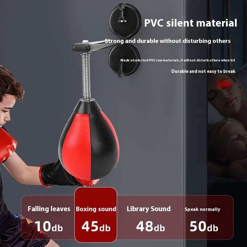Red and black pear-shaped hanging boxing training ball with elastic cord and suction cup mount.