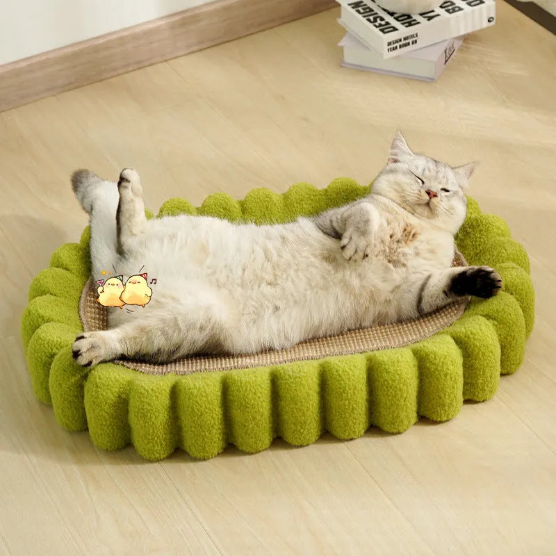 Green oval cat scratch pad bowl with sisal scratching surface and built-in cat bed
