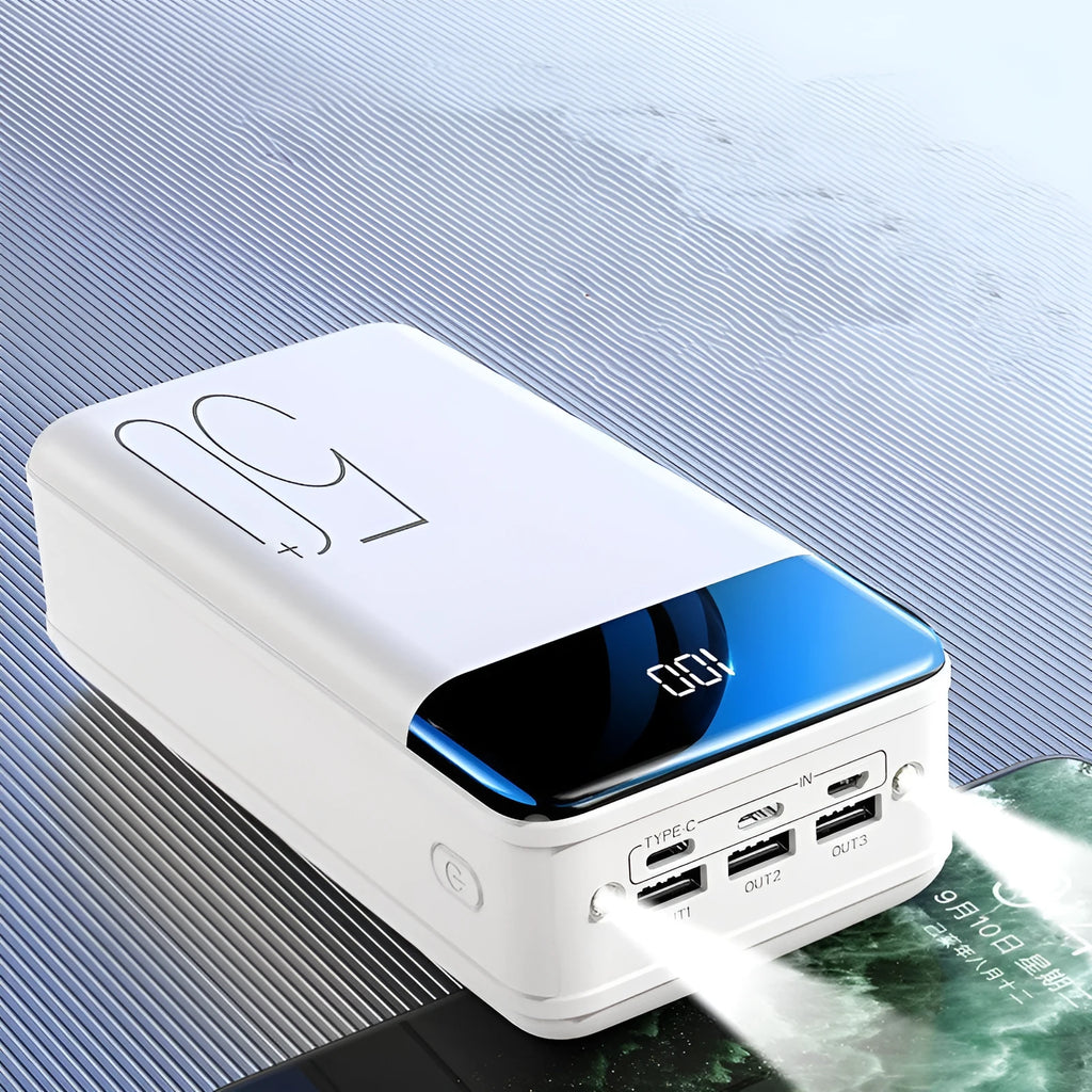 Black and white large capacity 50000mAh power bank with three USB output ports.