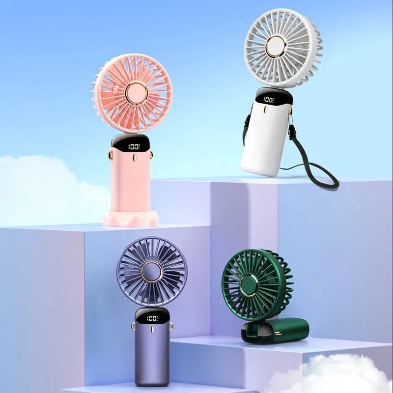 Mini portable handheld electric fan in blue with foldable design and LED battery display
