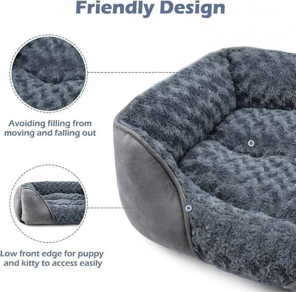 Beige bolster dog bed for large dogs with soft interior and raised sides on a wooden floor.