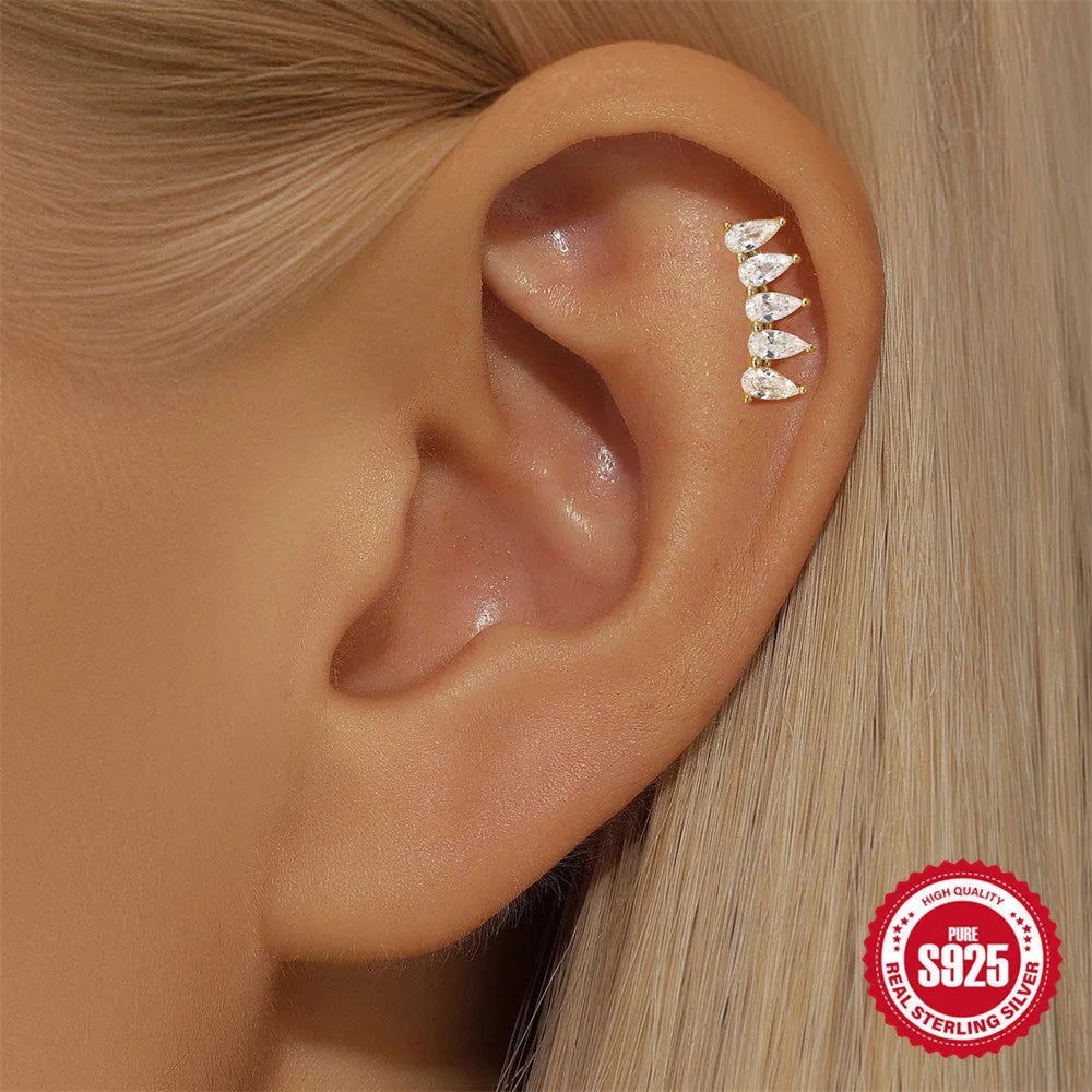 Geometric S925 sterling silver moon and star earrings with diamond embedded embellishment on a white background.