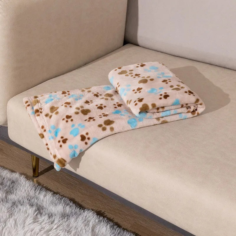 Blue cartoon dog pattern double-sided pet blanket shown on a dog bed, with size options 60x80cm, 100x120cm, 100x150cm.