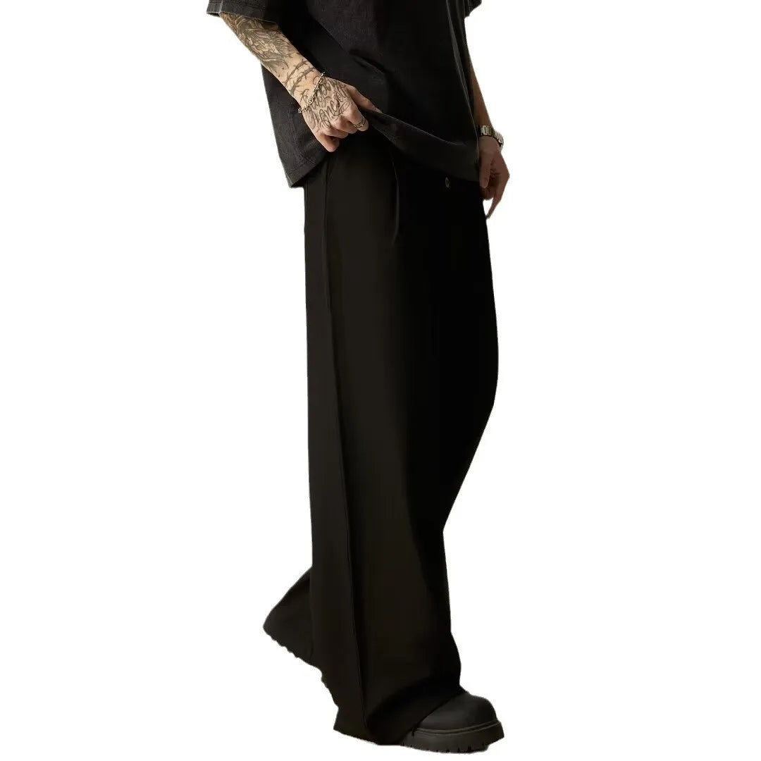 Men's vertical tube wide-leg trousers in solid black colour with micro-elastic waistband