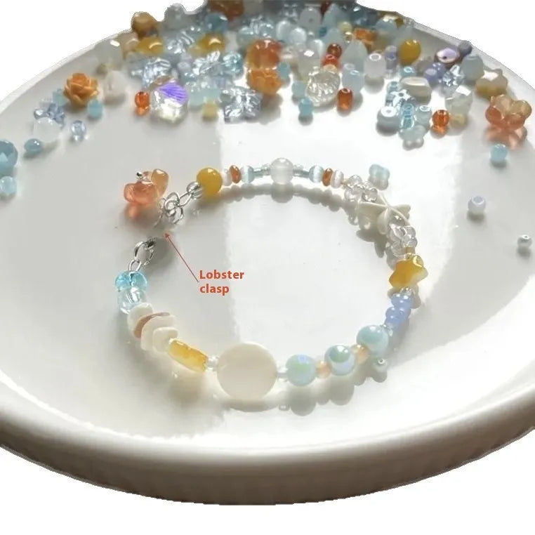 Mixed-material orange sea summer bracelet with diamond shape and round alloy elements