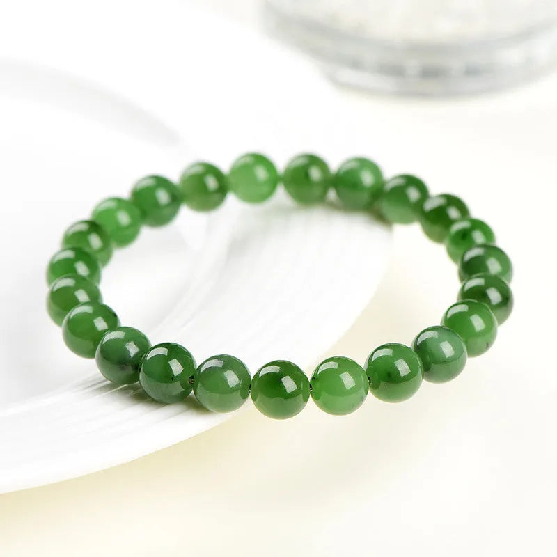 Natural jasper ball bracelet showing polished stone beads in one of five available sizes.