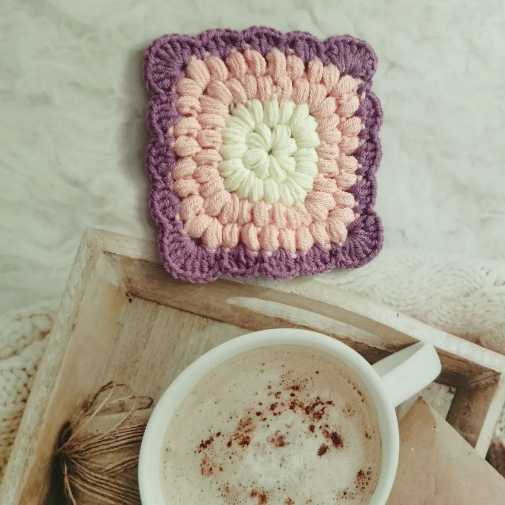 Crocheted wool insulated cup placemat with grandmother lattice pattern in colour choice