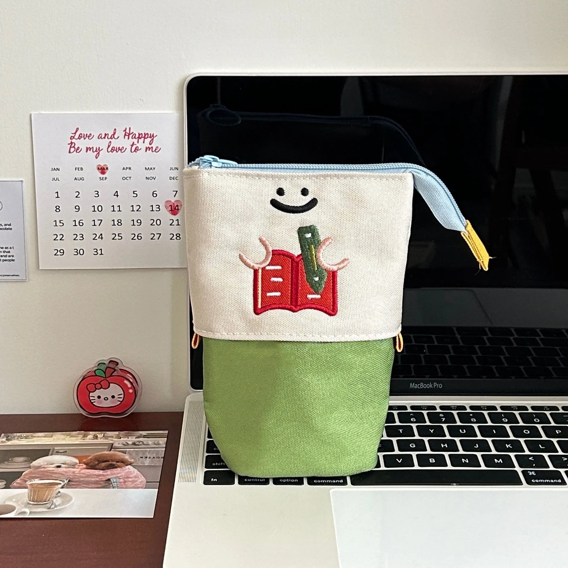 Brown and green Korean-style collapsible Oxford fabric pencil case showing 17cm by 14cm size.