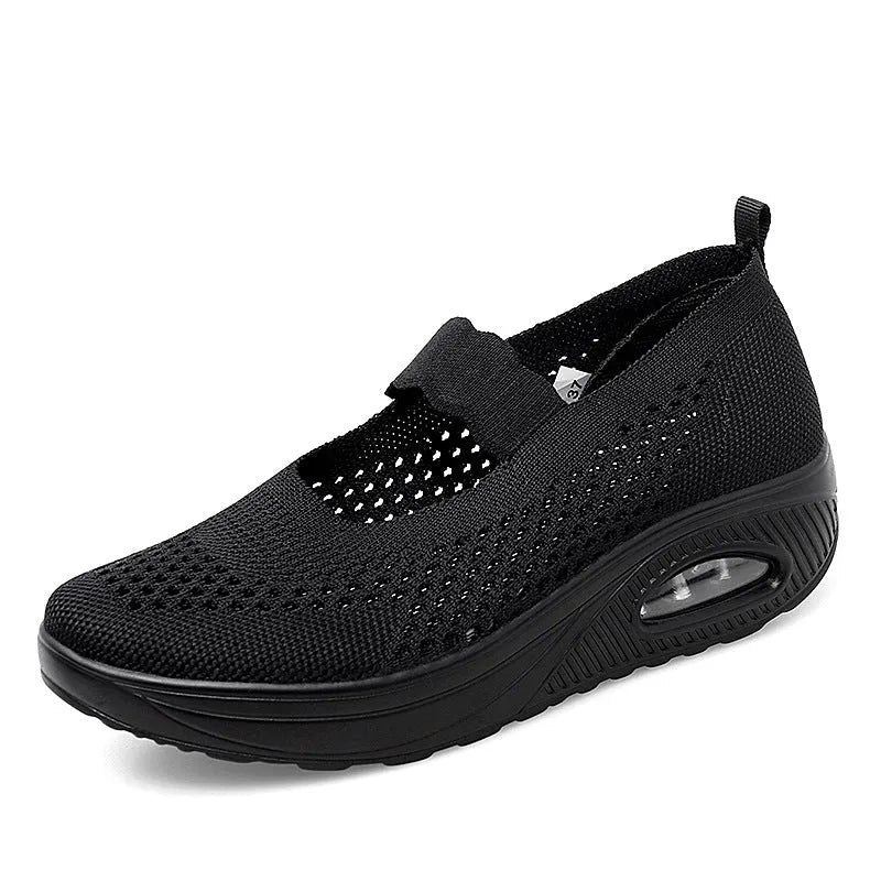 Women's black mesh slip-on casual shoes with round toe and low heel