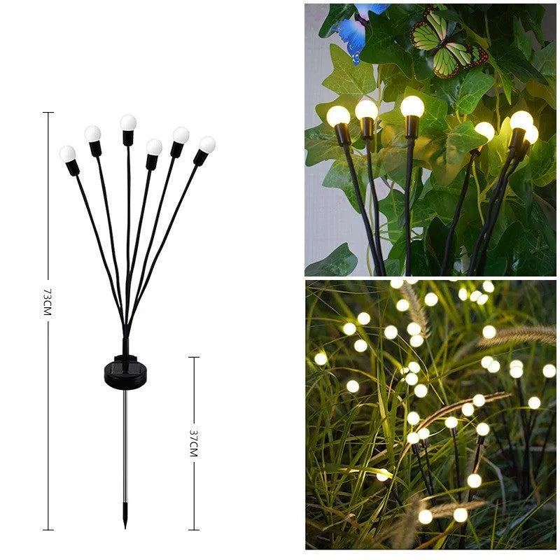 Solar-powered LED garden light with multiple heads on stainless steel ground spikes