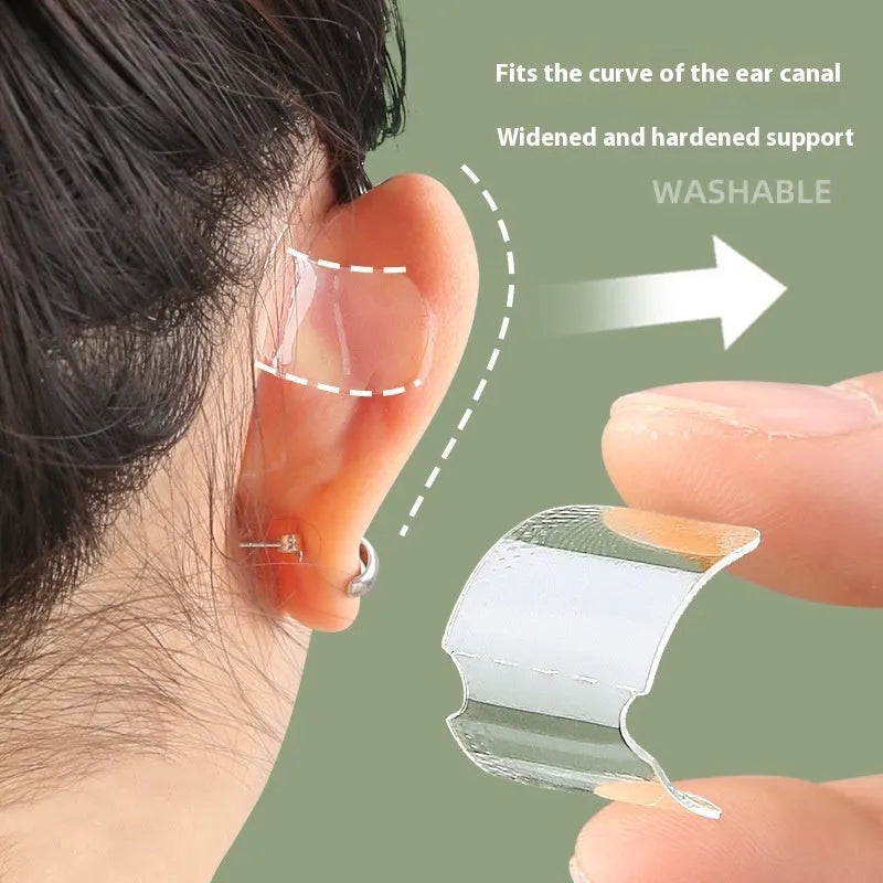 Close-up of transparent and frosted TPU ear patches on backing paper, showing 0.1cm thickness.