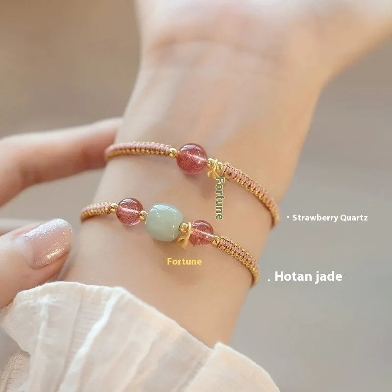 Adjustable red rope bracelet with strawberry quartz beads, showcasing national style design.