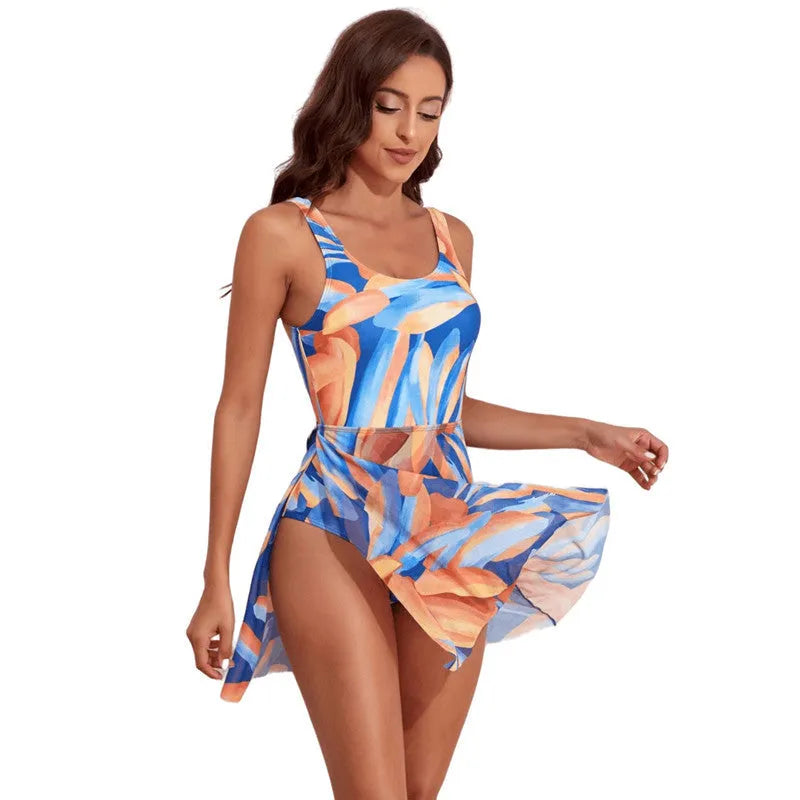 Women's one-piece floral swimsuit with a single slant shoulder strap and slim waist design.