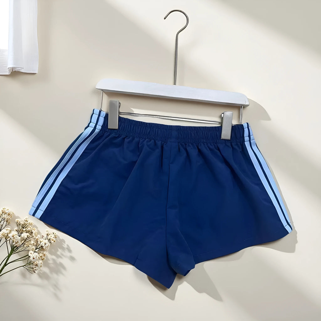 Navy blue men's nylon sport shorts with high-waist elastic waistband