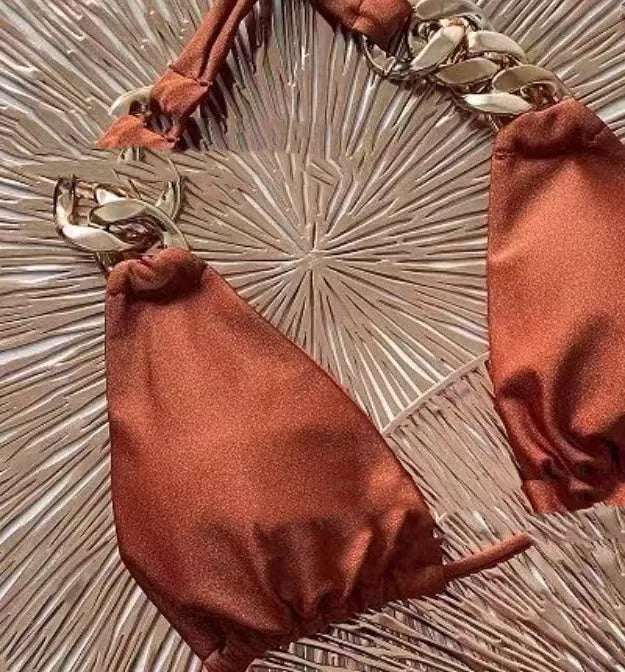 Brown women's tube-top push-up bikini swimsuit with a ring tether detail.