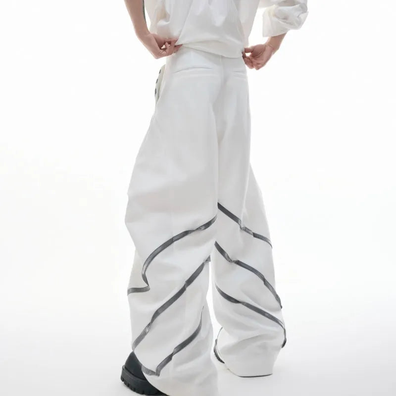 Men's polyester trousers with three-dimensional cutting and metal striped rivet pleated design in black and white colour options