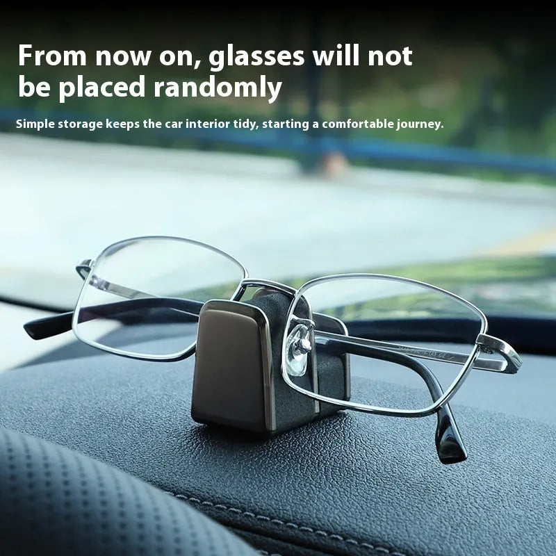 Zinc alloy and leather glasses clip for car dashboard in choice of colours.