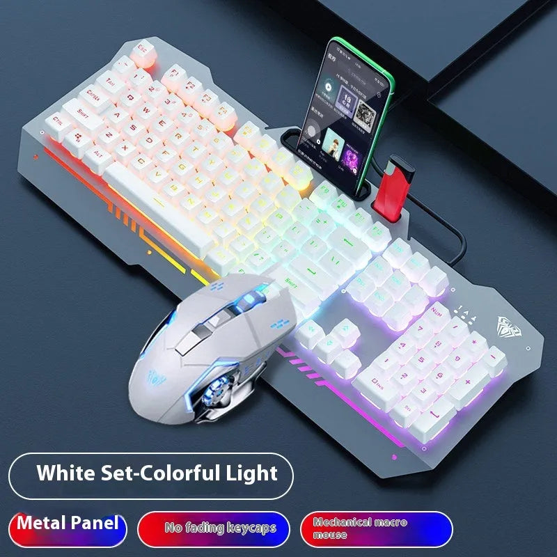 Black and white mechanical keyboard and mouse PC gaming bundle with headset on a desk
