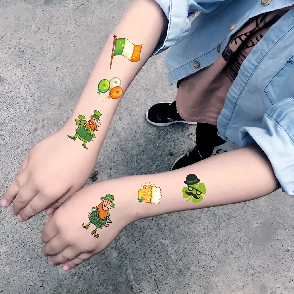 Children's temporary tattoo sticker with green Irish festival flag and clover design on paper.