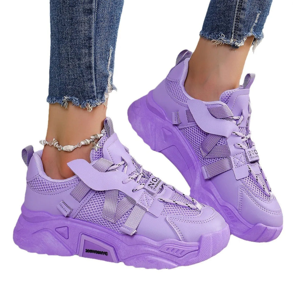 Women's purple animal pattern platform mesh dad shoes with lace-up front.