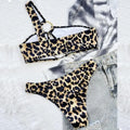 Women's leopard print polka dot bikini top and shorts set on a mannequin