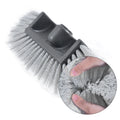 Yellow portable car wash brush with four-section removable rod and flow-through brush head design