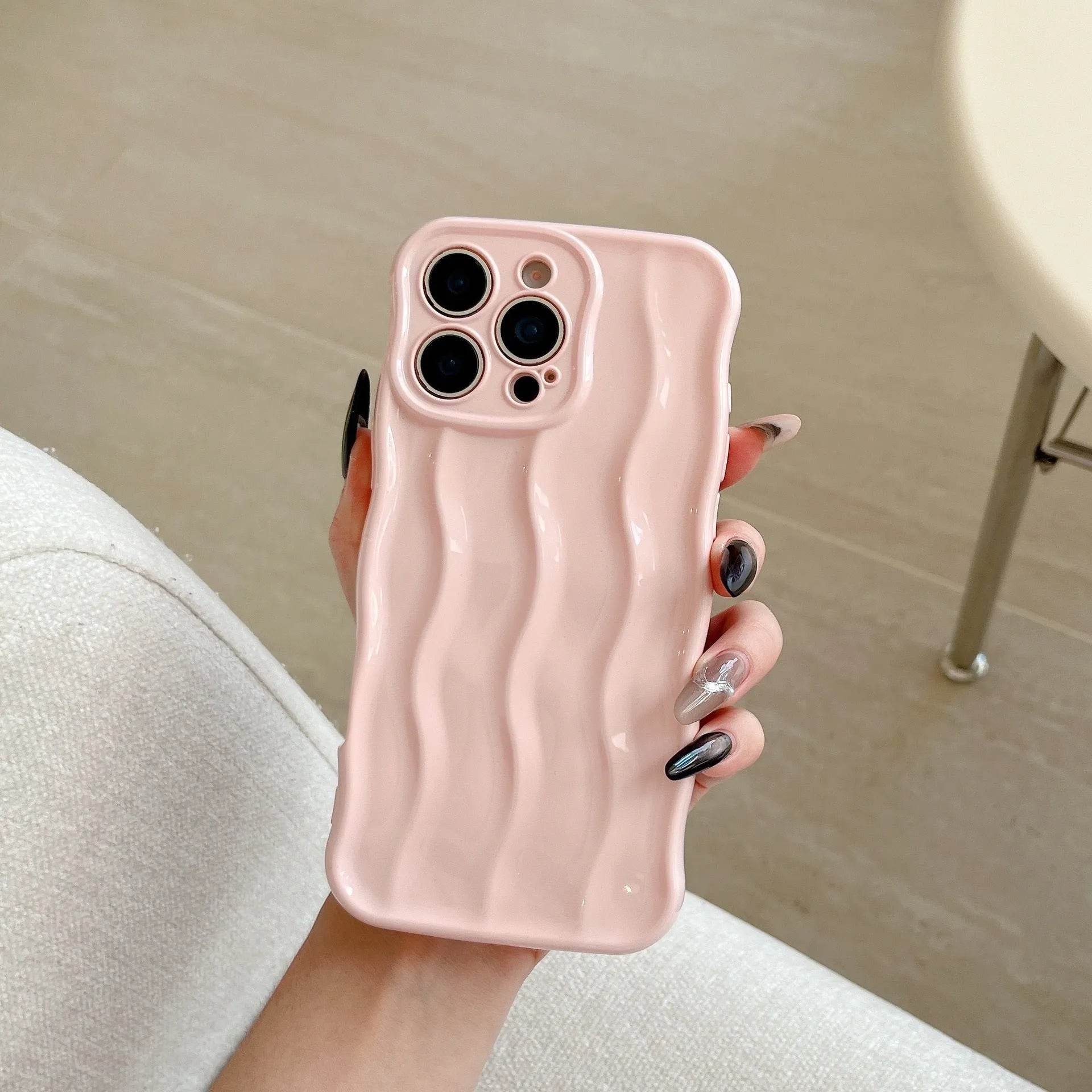 Electroplated three-dimensional wave stripe protective phone case for iPhone 17 series in various colour options.