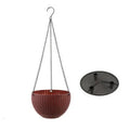 Plastic hanging basket planter with inner pot and metal chain, shown in green colour.