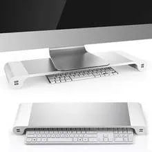 Aluminium and plastic computer monitor stand with four USB ports and hidden keyboard storage underneath