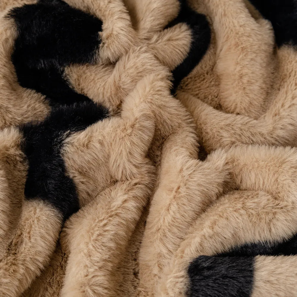 Zebra pattern flannel sofa cover with matching pillowcase in a light luxury style.