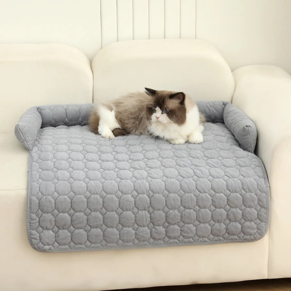 Thick corduroy pet bed mat with neck pillow in beige, 75x75cm, on a floor