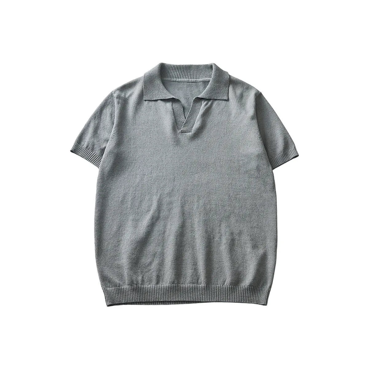 Short-sleeved polo collar casual t-shirt in solid colour on a hanger.