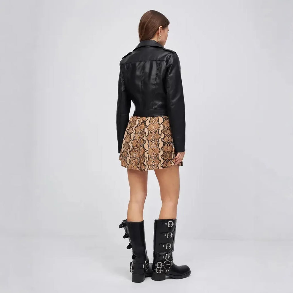 Women's black retro-style PU leather jacket with regular sleeves on a model.