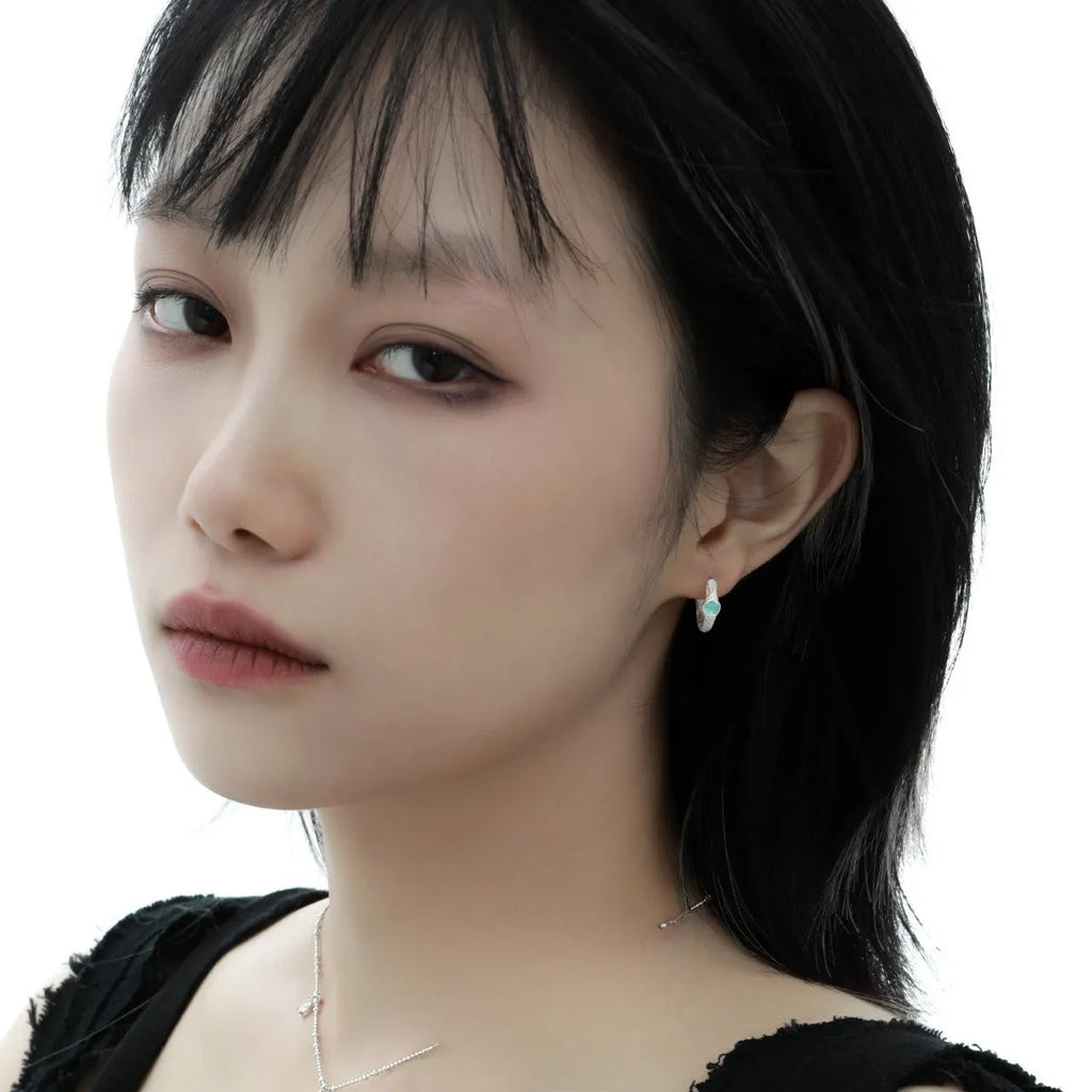 Geometric burnt silver 925 silver ear clip for women with round design elements
