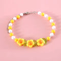 Colourful pearl bead pet necklace in small flower, rainbow, or peach designs with adjustable sizing for cats and small dogs.