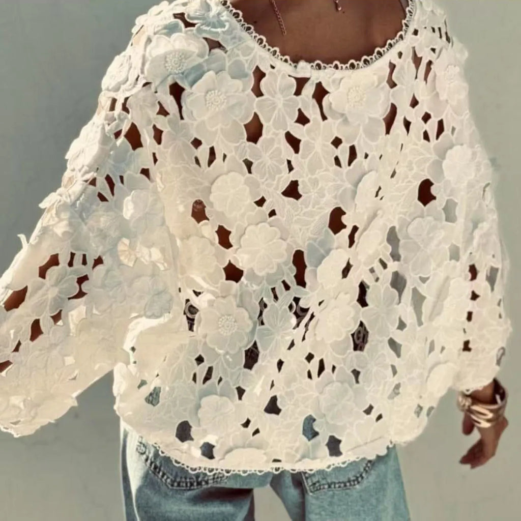 Loose black lace V-neck cardigan with a three-dimensional lace flower decoration on the chest.