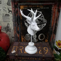 A tall resin giraffe statue home decoration in black, white, or wood colour, shown next to a ruler indicating its 32cm height.