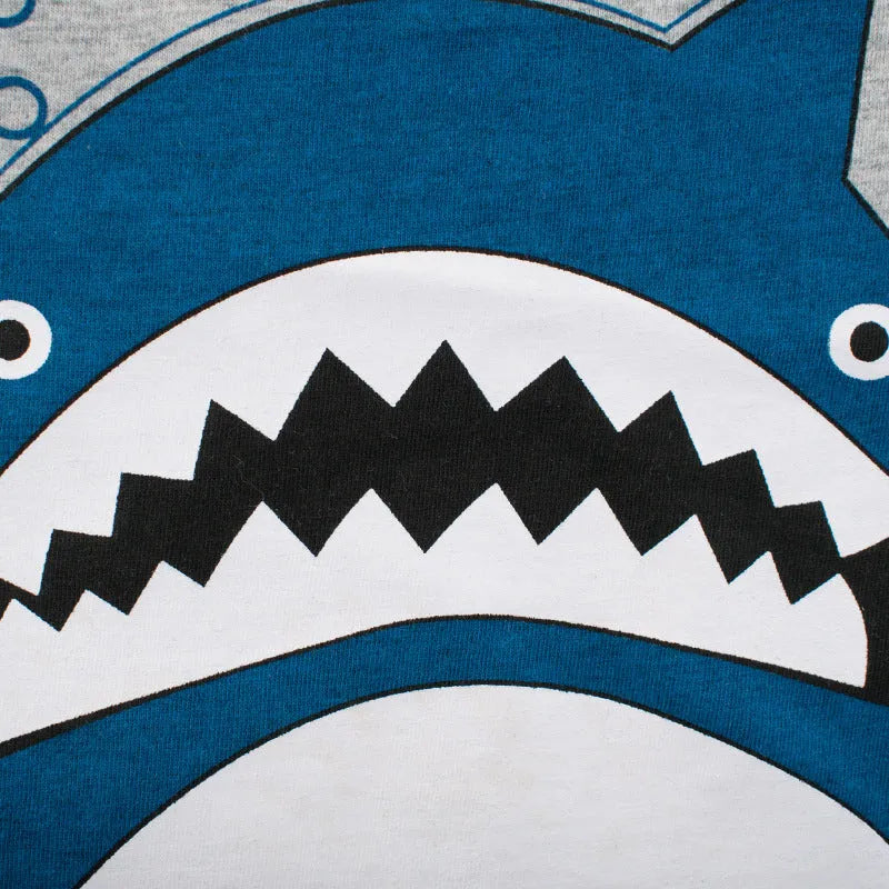 Grey children's cotton T-shirt shown with a size chart listing measurements from 90cm to 140cm.