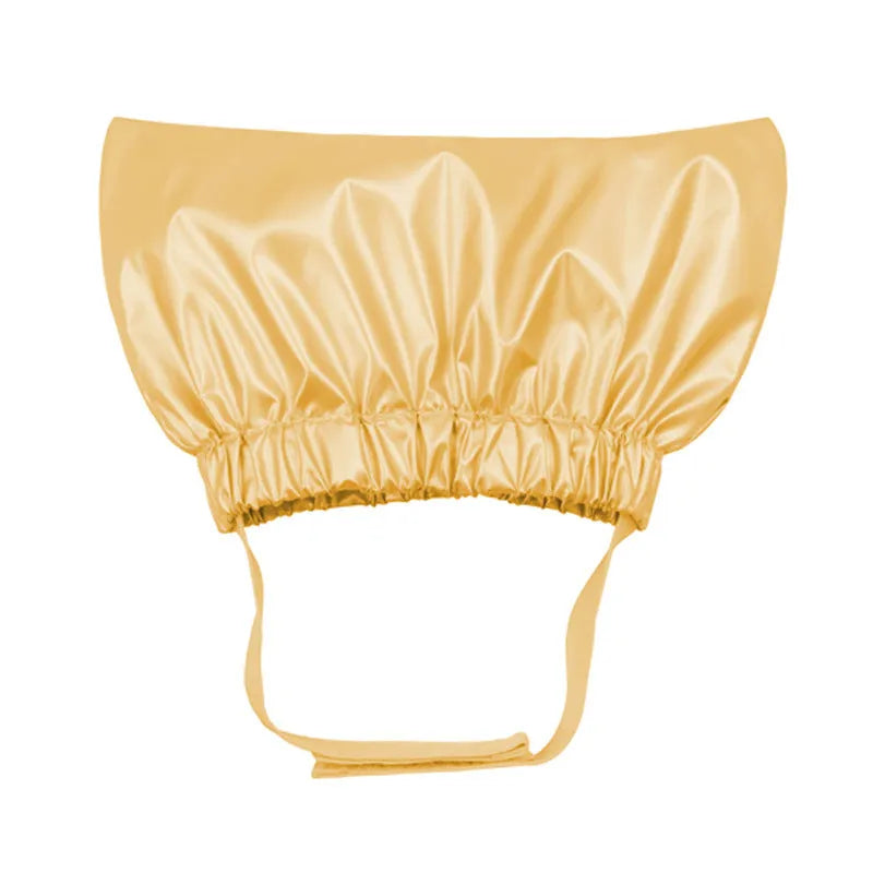Pet shower cap in silver colour showing adjustable ear coverage and waterproof non-woven fabric construction