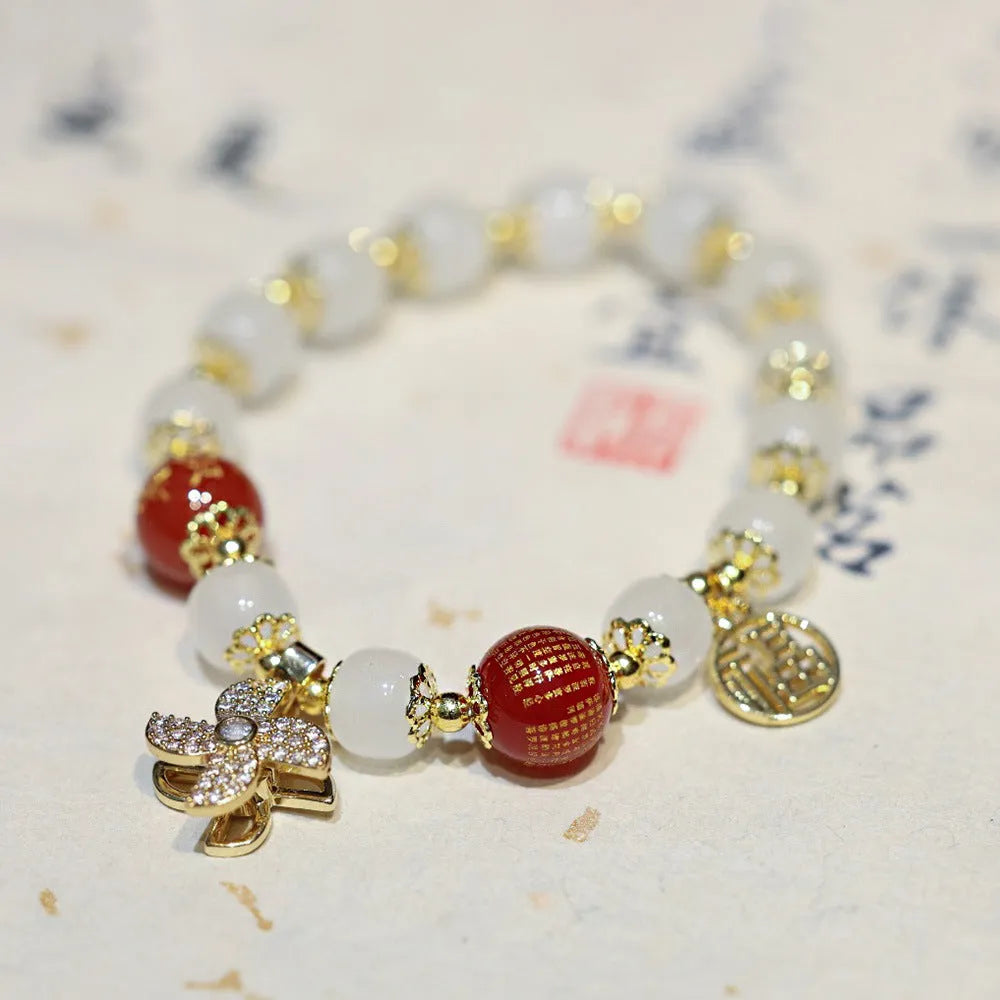 Women's Chinese style glass bracelet with Fu character and safety lock design in coloured glaze