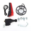 Silver bicycle dynamo-powered generator light kit for front fork or rear frame mounting.