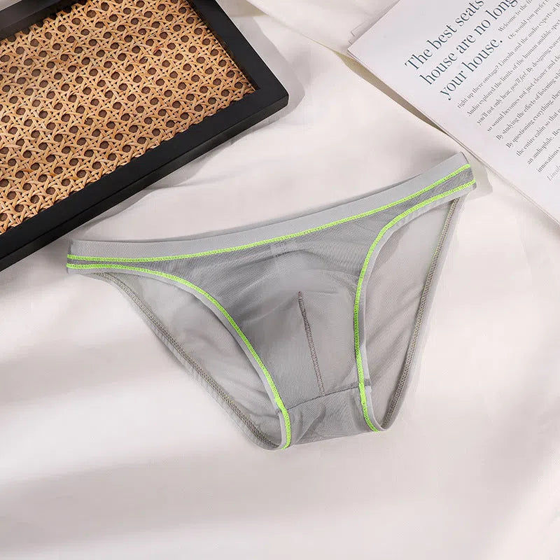 Transparent men's triangle underwear in white, seamless stretch knit nylon fabric, solid colour pattern