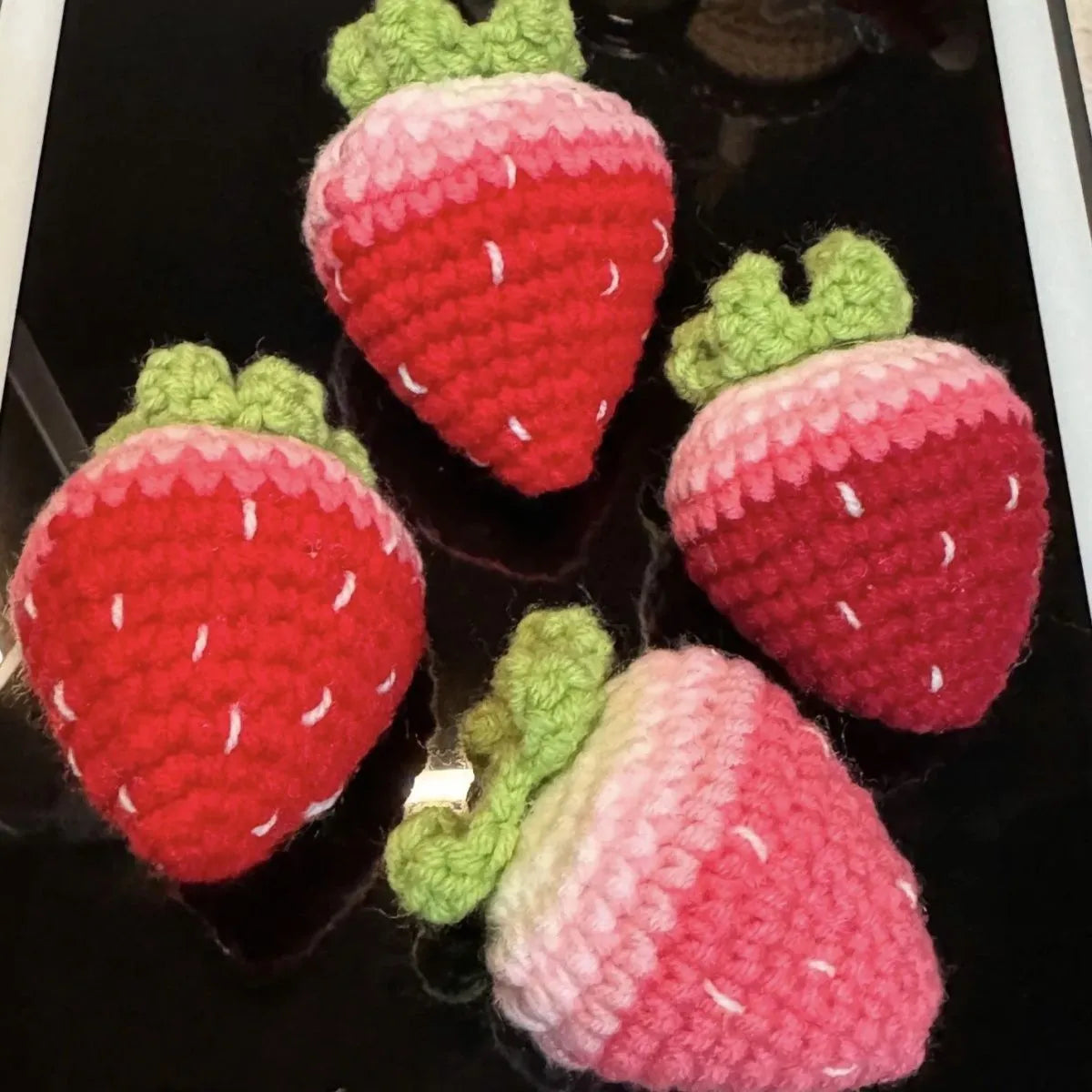 Soft plush strawberry pendant keychain in pink and red colour options with metal ring