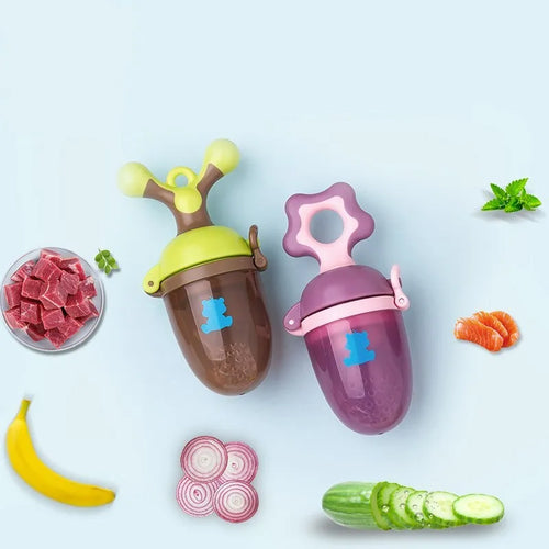 Purple and green polypropylene baby bite trainer with textured grip surface