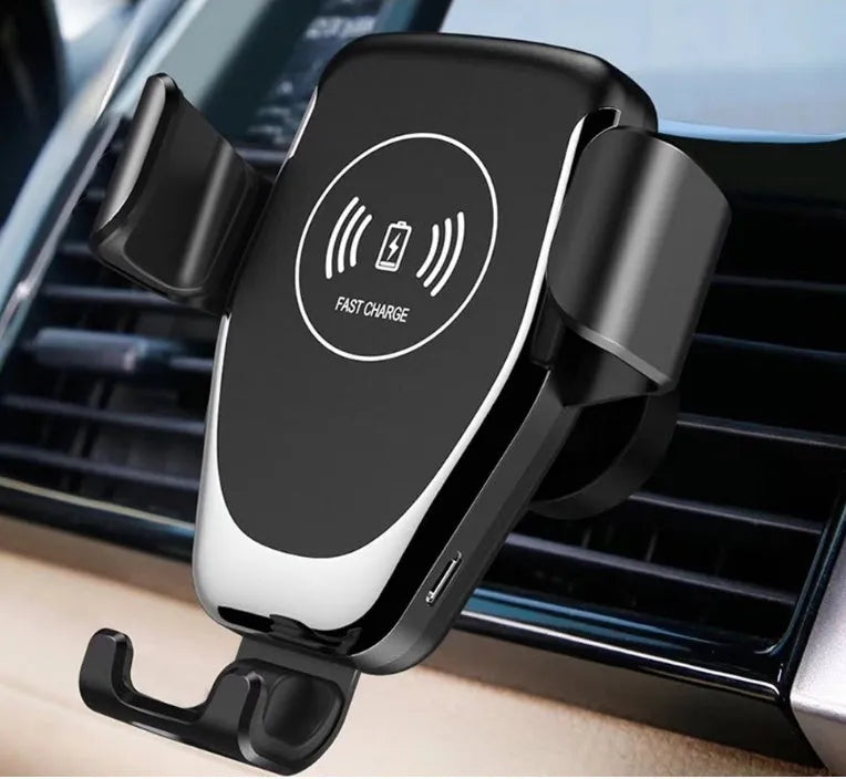 Black car wireless charger mounted on dashboard showing iPhone in automatic clamp