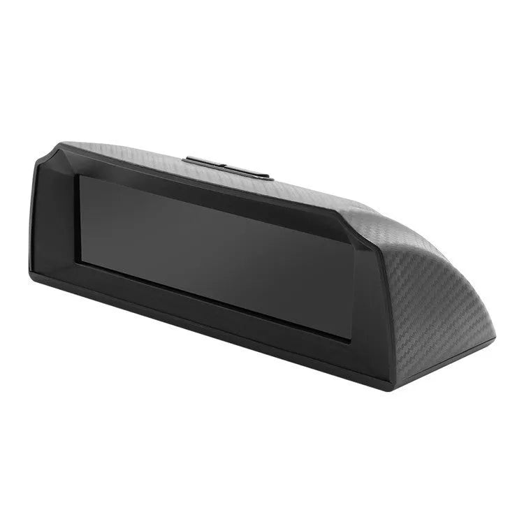 GPS GO 2 universal car head-up display with carbon fibre body on a dashboard showing speed and gradient data.