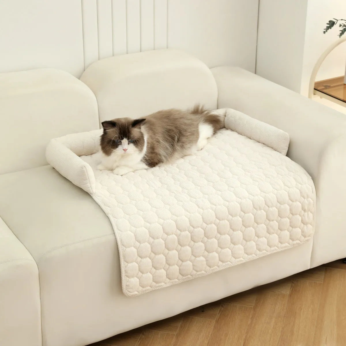 Thick corduroy pet bed mat with neck pillow in beige, 75x75cm, on a floor