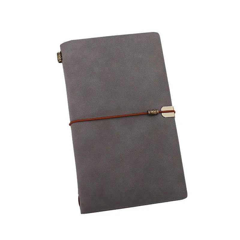 A6 notebook with imitation leather cover in grey, pink or red colours showing cowhide rope binding