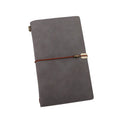A6 notebook with imitation leather cover in grey, pink or red colours showing cowhide rope binding